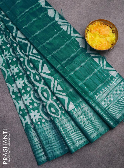 Semi tussar saree teal green with allover batik prints and long temple design silver zari woven border