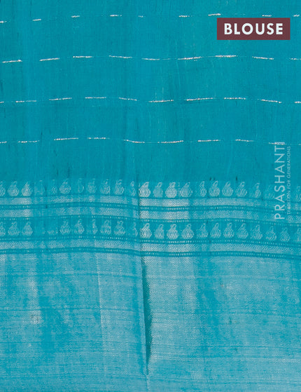 Semi tussar saree teal green and beige with allover batik prints and long silver zari woven border