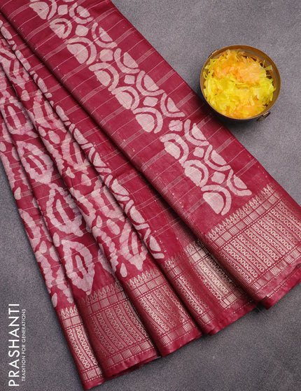 Semi tussar saree maroon with allover batik prints and zari woven border