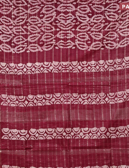 Semi tussar saree maroon with allover batik prints and zari woven border