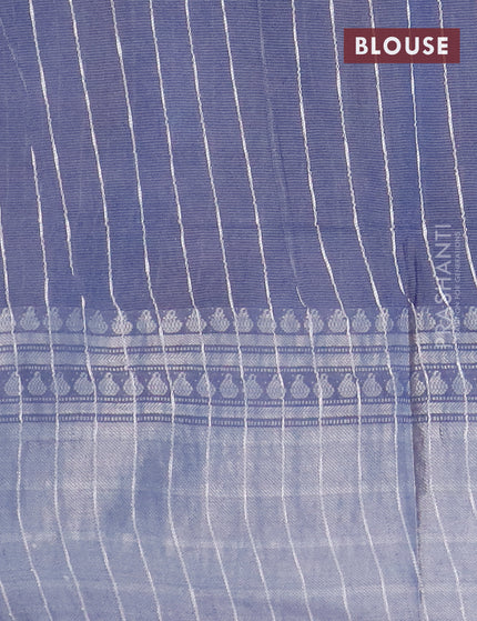 Semi tussar saree off white and dark grey with allover batik prints and long zari woven border