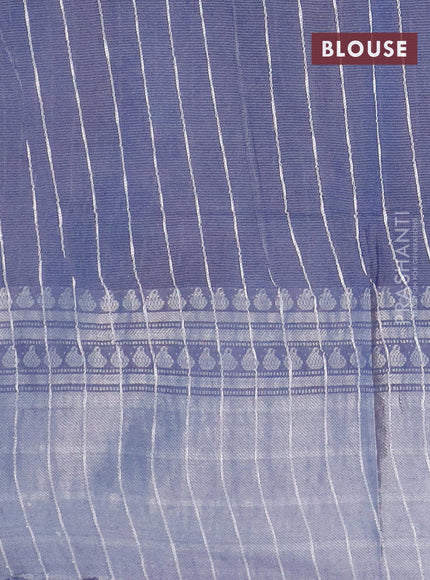 Semi tussar saree off white and dark grey with allover batik prints and long zari woven border