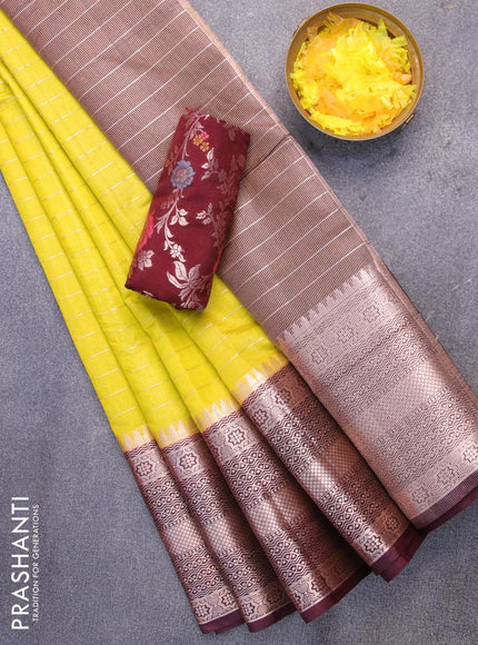 Semi dupion saree lime yellow and deep maroon with allover zari stripes pattern and long zari woven border & meenakari blouse