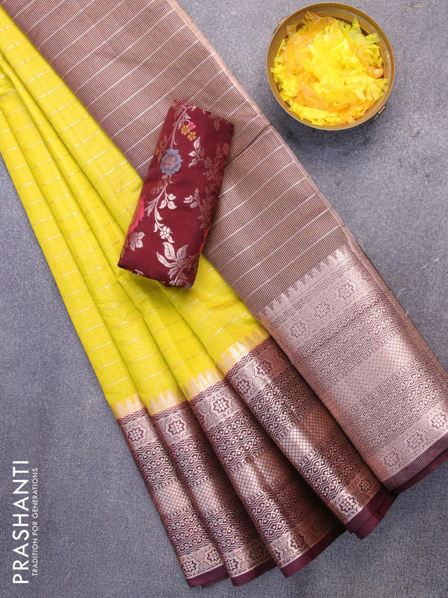 Semi dupion saree lime yellow and deep maroon with allover zari stripes pattern and long zari woven border & meenakari blouse