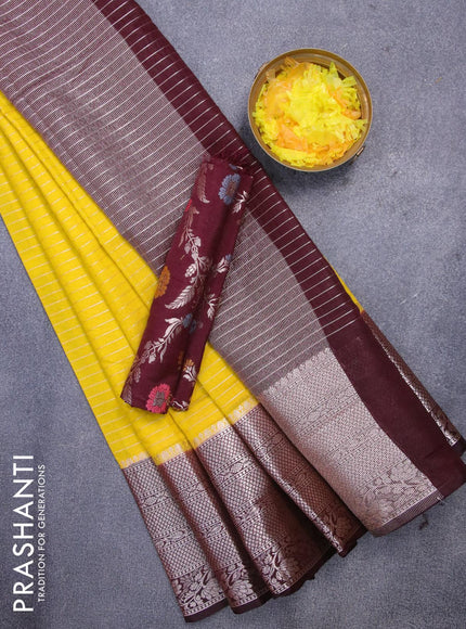 Semi dupion saree yellow and deep maroon with allover zari stripes pattern and long zari woven border & meenakari blouse