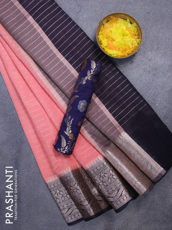 Semi dupion saree peach shade and dark navy blue with allover zari stripes pattern and long zari woven border & meenakari blouse