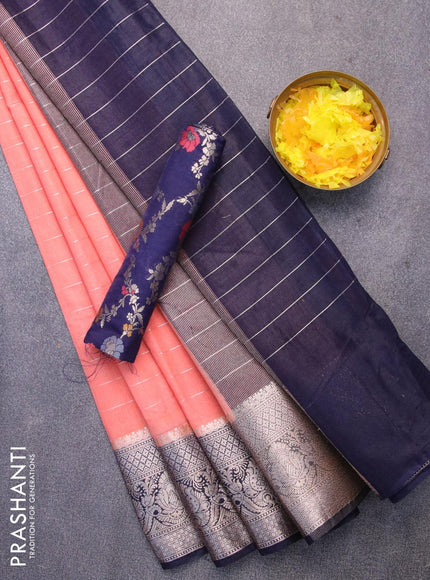 Semi dupion saree peach orange and navy blue with allover zari stripes pattern and zari woven border & meenakari blouse