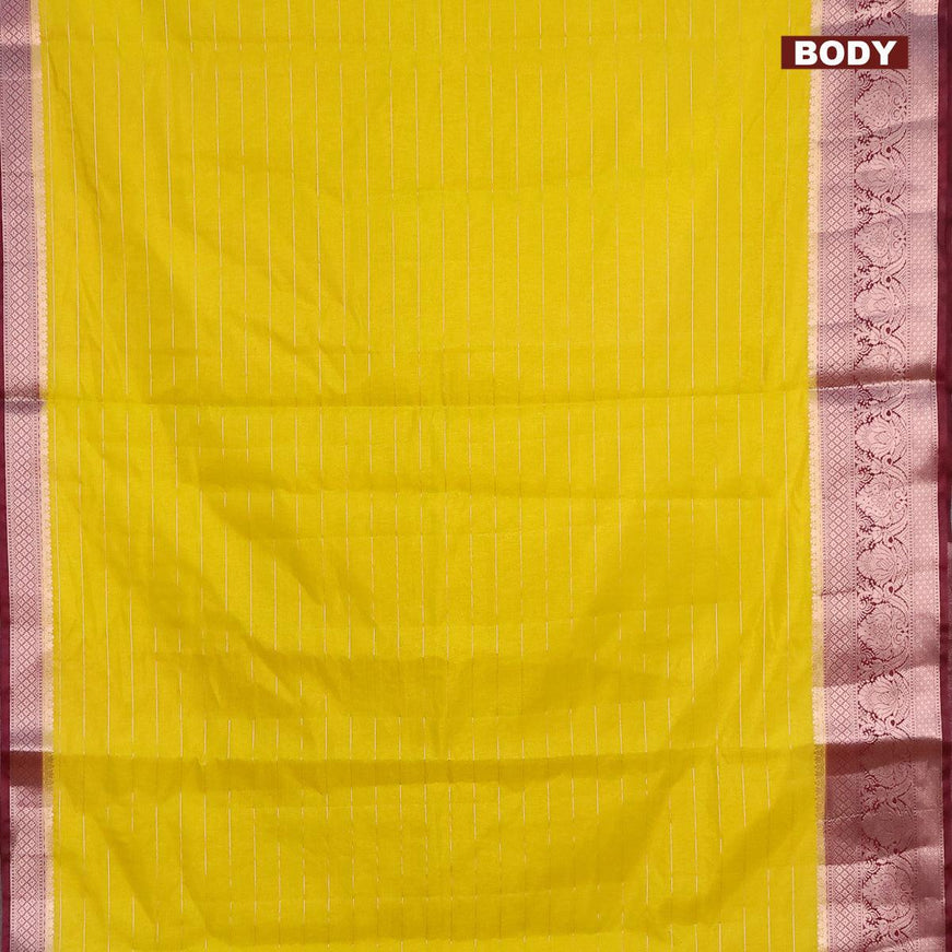 Semi dupion saree yellow and deep maroon with allover zari stripes pattern and long zari woven border & meenakari blouse