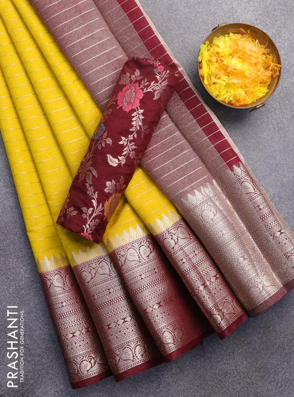 Semi dupion saree yellow and deep maroon with allover zari stripes pattern and long zari woven border & meenakari blouse