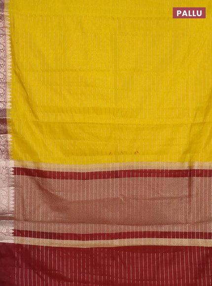 Semi dupion saree yellow and deep maroon with allover zari stripes pattern and long zari woven border & meenakari blouse