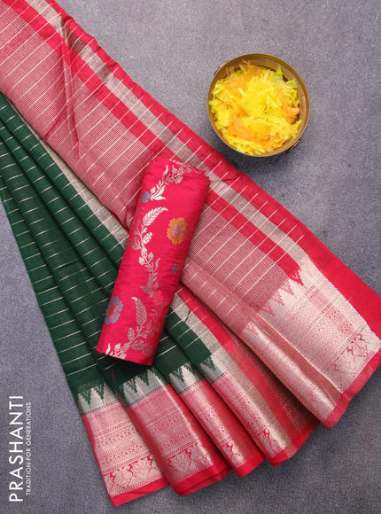 Semi dupion saree dark green and tomato red with allover zari stripes pattern and temple zari woven border & meenakari blouse