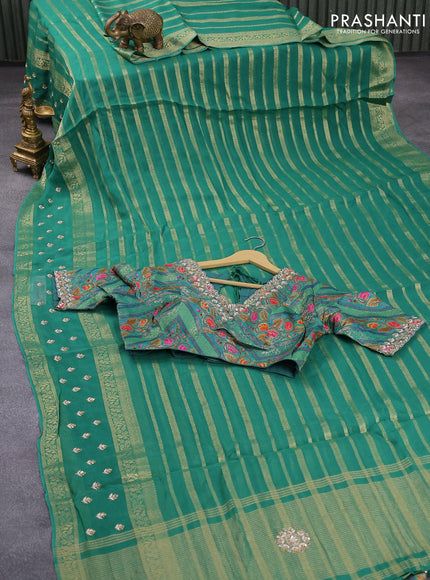 Organza silk saree teal green with allover zari stripes pattern and embroidery work butta border & embroidery work readymade blouse