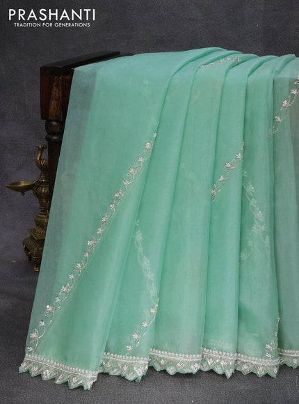 Organza silk saree teal green shade with allover beaded work and zardosi work border & embroidery work readymade blouse