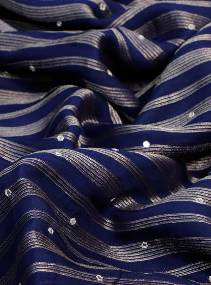 Organza silk saree dark blue with allover zari woven stripes pattern & mirror work and gottapatti lace work border & embroidery work readymade blouse