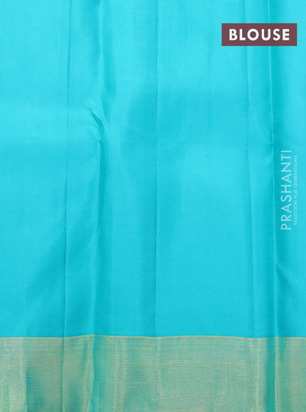 Pure kanjivaram silk saree dual shade of pinkish orange and teal blue with paisley zari woven buttas and long zari woven border & butta style