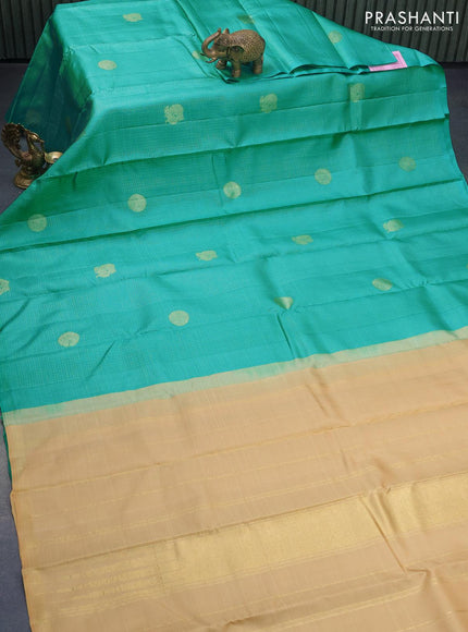 Pure kanjivaram silk saree teal blue and sandal with allover zari checks & annam buttas in borderless style & borderless style