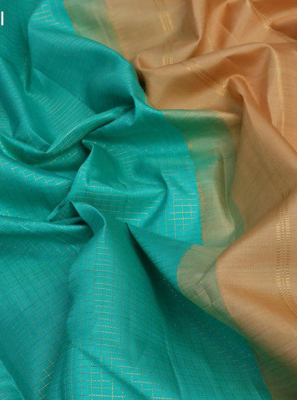 Pure kanjivaram silk saree teal blue and sandal with allover zari checks & annam buttas in borderless style & borderless style