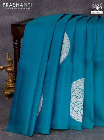 Pure kanjivaram silk saree teal blue and deep purple with silver zari woven buttas in borderless style & borderless style