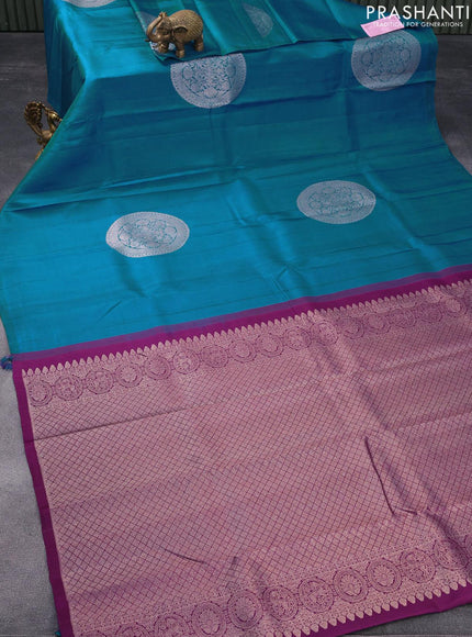 Pure kanjivaram silk saree teal blue and deep purple with silver zari woven buttas in borderless style & borderless style