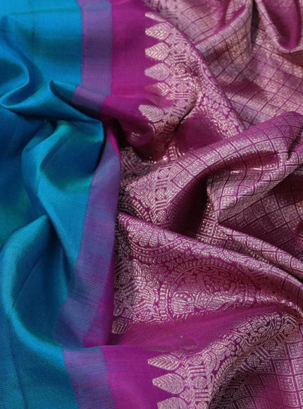 Pure kanjivaram silk saree teal blue and deep purple with silver zari woven buttas in borderless style & borderless style