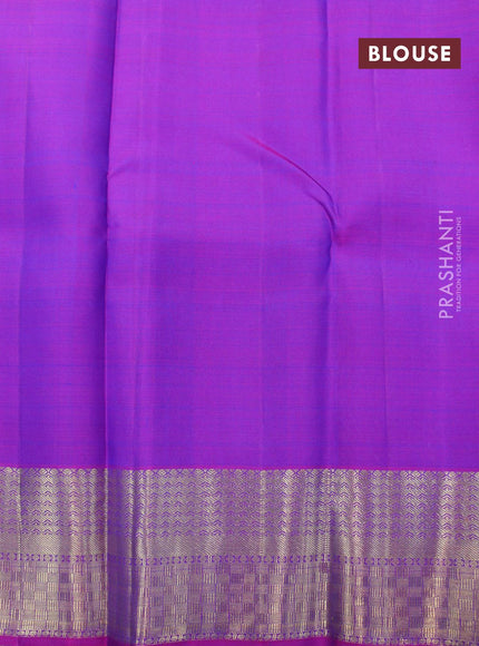 Pure kanjivaram silk saree dual shade of bluish green and purple with zari woven buttas and zari woven border & butta style