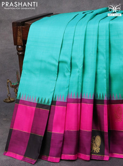 Pure kanjivaram silk saree teal blue and multi colour with plain body and temple design zari woven butta border &