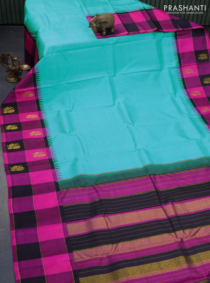 Pure kanjivaram silk saree teal blue and multi colour with plain body and temple design zari woven butta border &