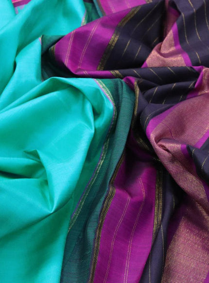 Pure kanjivaram silk saree teal blue and multi colour with plain body and temple design zari woven butta border &