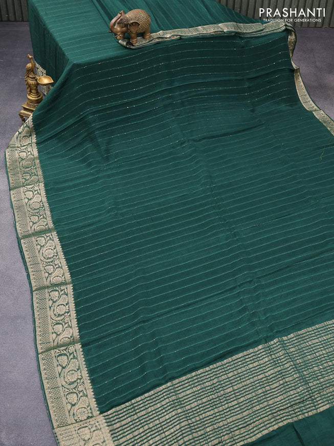 Chinon silk saree green with allover sequin work and zari woven floral border & zari butta blouse