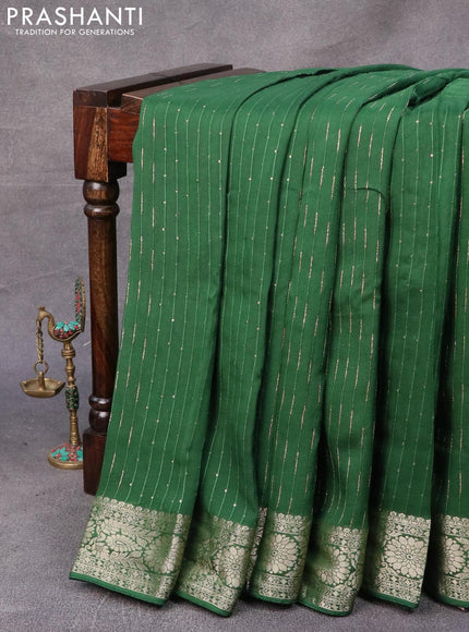 Chinon silk saree green with allover sequin work and zari woven floral border & zari butta blouse