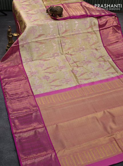 Pure kanjivaram tissue silk saree elaichi green and pink with allover zari woven parrot designbrocade weaves and long zari woven korvai border