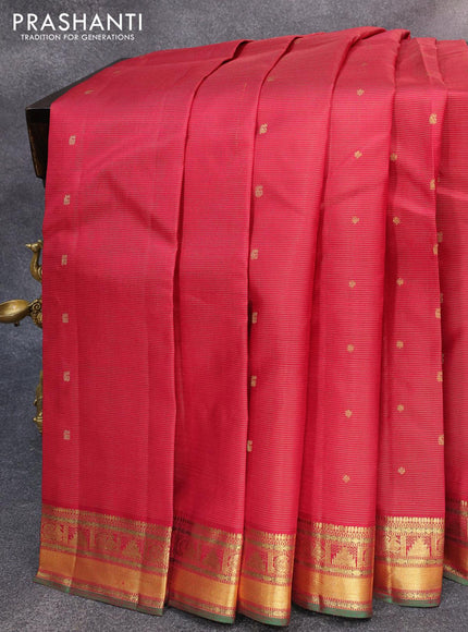 Pure kanjivaram silk saree maroon and dual shade of green with allover zari stripes & buttas and temple & annam zari woven border