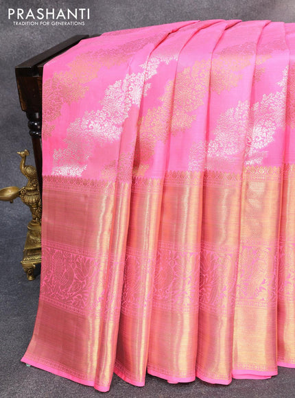 Pure kanjivaram silk saree candy pink with allover silver & gold zari woven floral weaves and long rich annam & parrot zari woven border