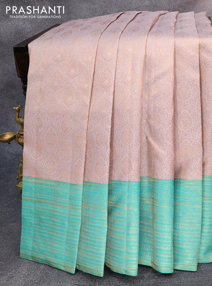 Pure kanjivaram silk saree grey and teal green shade with allover zari woven brocade weaves and zari woven border