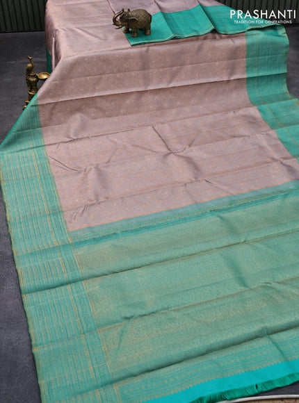 Pure kanjivaram silk saree grey and teal green shade with allover zari woven brocade weaves and zari woven border