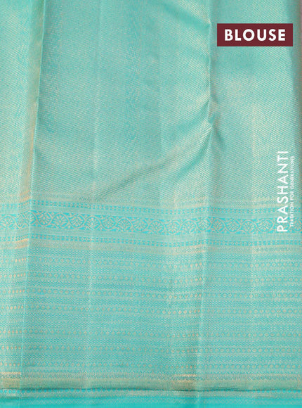 Pure kanjivaram silk saree grey and teal green shade with allover zari woven brocade weaves and zari woven border