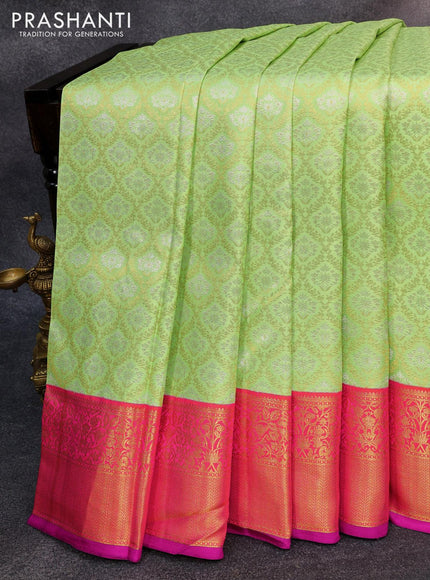 Pure kanjivaram silk saree pista green and dual shade of pinkish orange with allover silver & gold zari woven brocade weaves and floral zari woven korvai border