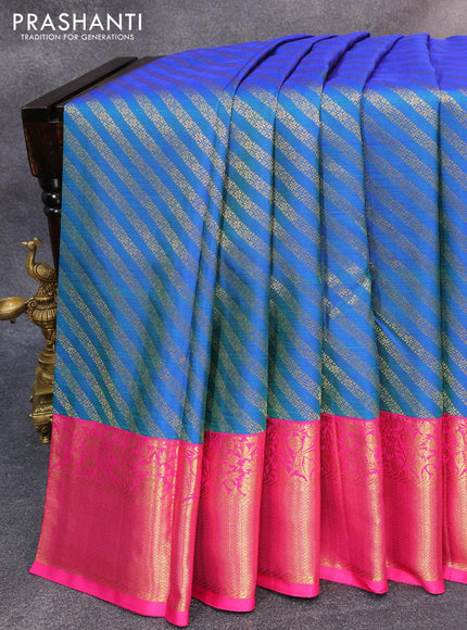 Pure kanjivaram silk saree dual shade of bluish green and pink with allover zari weaves and rich floral zari woven border