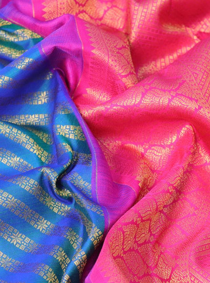 Pure kanjivaram silk saree dual shade of bluish green and pink with allover zari weaves and rich floral zari woven border