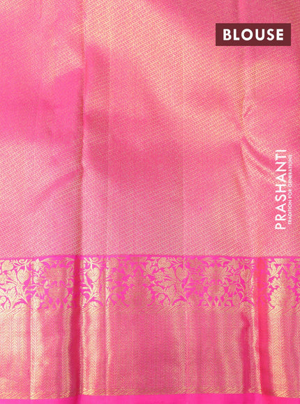 Pure kanjivaram silk saree dual shade of bluish green and pink with allover zari weaves and rich floral zari woven border