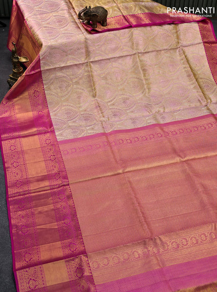 Pure kanjivaram tissue silk saree dual shade of cream and pink with allover zari woven brocade weaves and long rich zari woven border