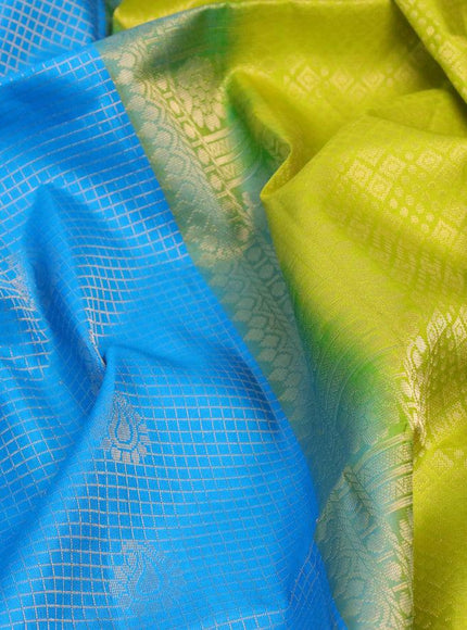 Pure soft silk saree cs blue and lime green with allover small zari checks & buttas and long zari woven border