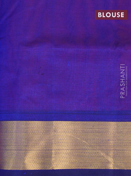 Silk cotton saree dual shade of pinkish orange and blue with plain body and zari woven border