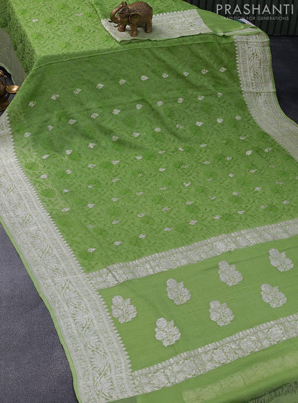 Banarasi chiffon saree light green with allover chikankari work and silver zari woven border - {{ collection.title }} by Prashanti Sarees