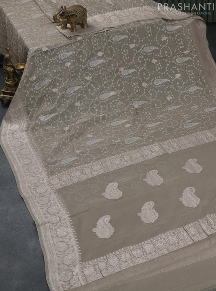 Banarasi chiffon saree pastel grey with allover chikankari work and silver zari woven border - {{ collection.title }} by Prashanti Sarees