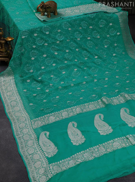 Banarasi chiffon saree teal blue shade with allover chikankari work and silver zari woven border - {{ collection.title }} by Prashanti Sarees