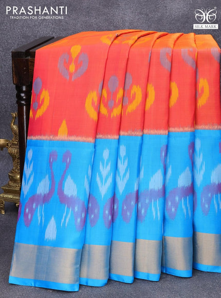 Ikat soft silk saree dual shade of pinkish orange and blue with allover ikat butta weaves and zari woven border - {{ collection.title }} by Prashanti Sarees