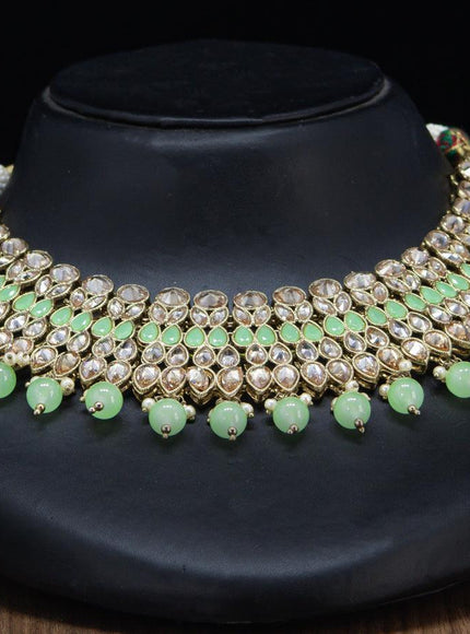 Kundan necklace with mint green beads and maang tikka - {{ collection.title }} by Prashanti Sarees