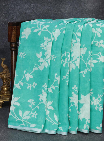 Linen cotton saree teal blue with allover floral prints and small silver zari woven border - {{ collection.title }} by Prashanti Sarees