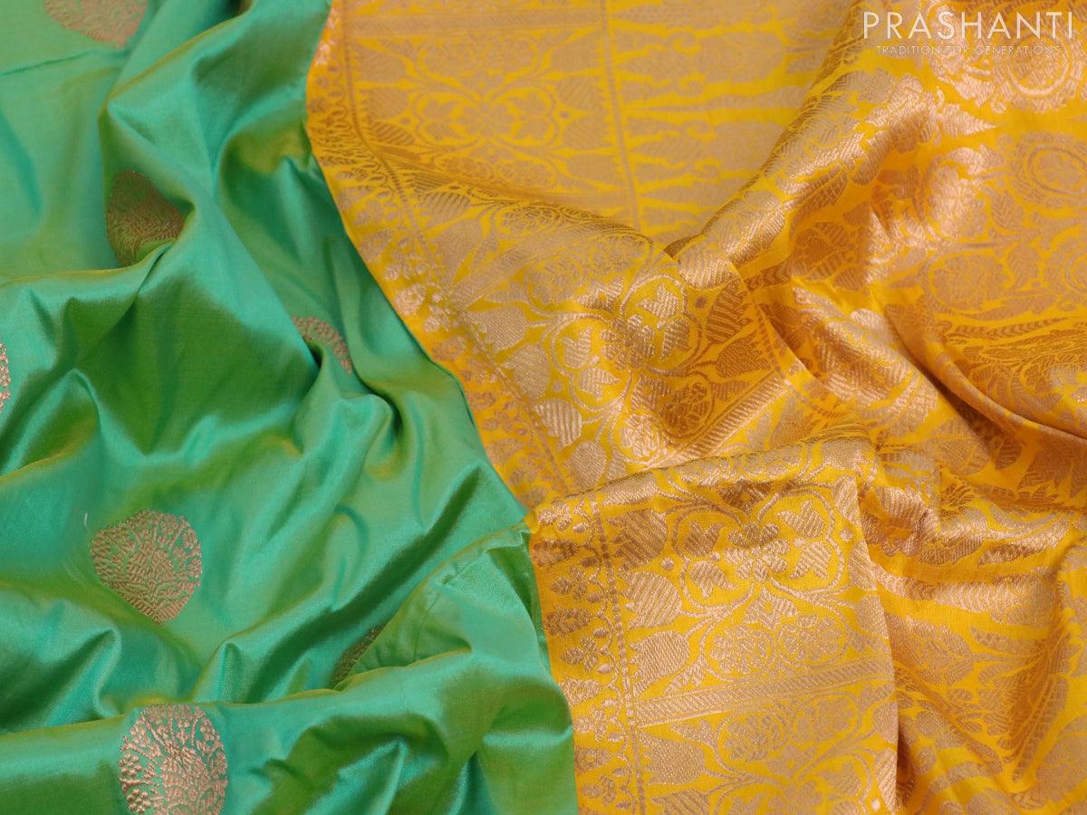 Buy Kanieshka™ Silks Pure Handloom Banarasi Katan Silk Saree With Rich  weaving Boarder Original Silk Certified Color: A Beautiful Shade of Green  with Rich Red and Golden Border Online at Best Prices